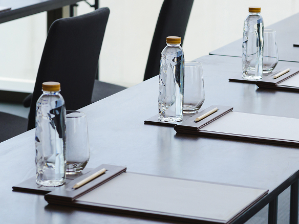 Professional conference rooms for your company event Tables in a conference room in Hameln